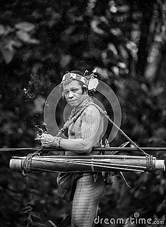 Man Mentawai tribe in the jungle. Editorial Stock Photo